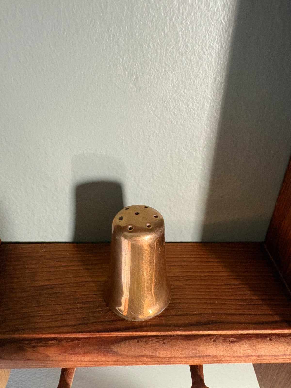 Golden ceramic thimble/salt shaker